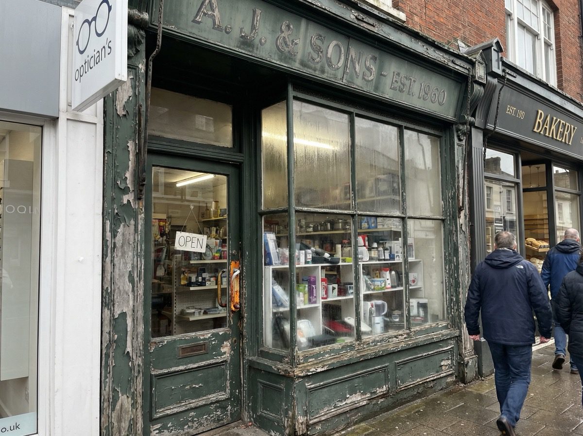 Worn faded shop front needing attention