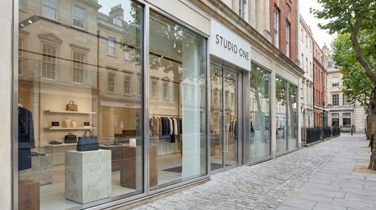 Modern shop front with toughened glass panels in aluminium frames